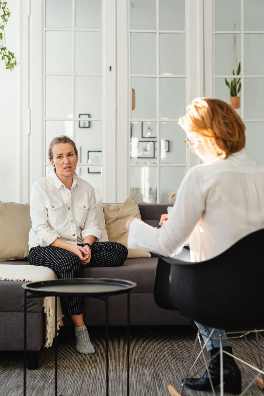 Woman in a therapy session with a professional